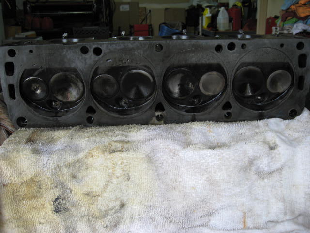 Engine cylinder head with four valves visible