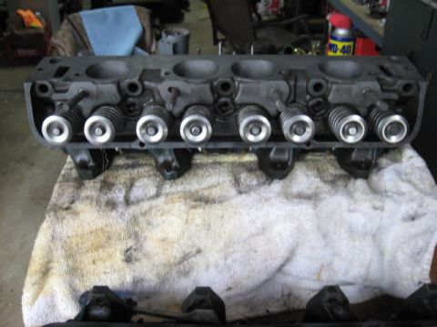 1963 Ford Galaxie - This engine cylinder head is shown with its valve springs and retainers. The registry label may be incorrect.