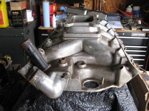 1963 Ford Galaxie - Aluminum intake manifold with visible text, likely for a vintage car part.