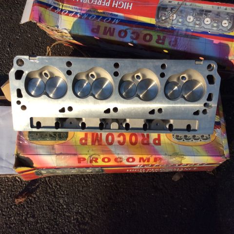 1979 Ford Bronco - Engine cylinder head from Procomp, shown on its packaging.