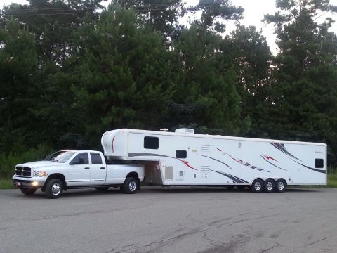 1967 Ford Mustang - White Dodge Ram pickup truck towing a large white gooseneck trailer.
