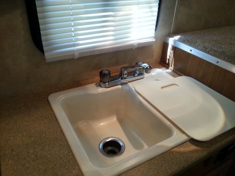 1967 Ford Mustang - Interior view of a sink area in what appears to be an RV or camper.