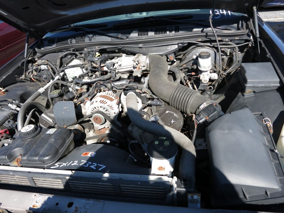 Engine bay with visible serial numbers SX127327 and 1341