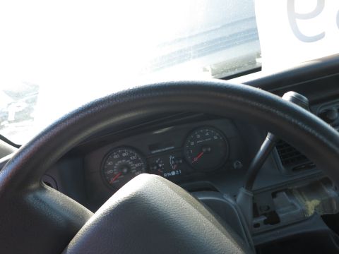 2001 Ford Crown Victoria - Interior view of a 2001 Ford Crown Victoria dashboard with visible gauges and steering wheel.