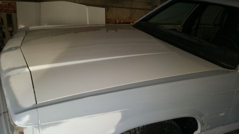 1991 Ford LTD Crown Victoria - This 1991 Ford Crown Victoria LTD is shown from a 3q-front perspective, highlighting its freshly prepared hood and fender.