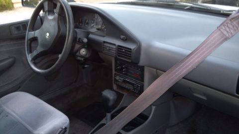 1993 Mercury Tracer - Interior view of a 1993 Mercury Tracer, highlighting the dashboard and seating area.