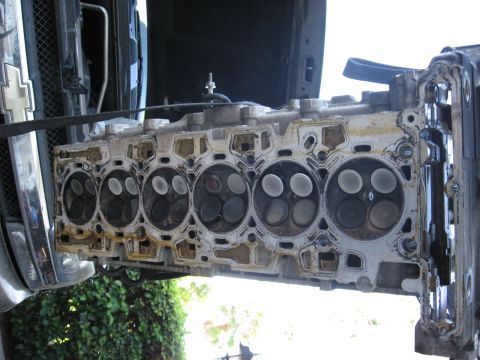 1994 Ford Bronco - Engine cylinder head removed for service, showing the valve train components.