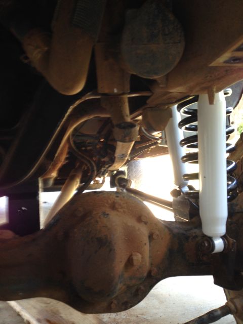 1996 Ford Bronco - New shocks and springs are visible on the rear axle of this vehicle.