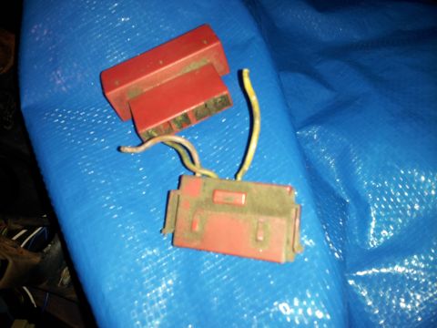 1976 Ford Ranchero - Red electrical connectors with wires are shown on a blue tarp.