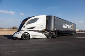 2000 Ford 427 - Walmart semi-truck with aerodynamic cab and trailer on a paved surface.