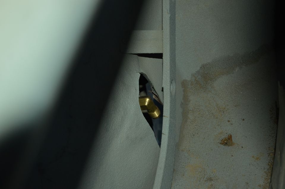 close-up of brass fitting on propane tank