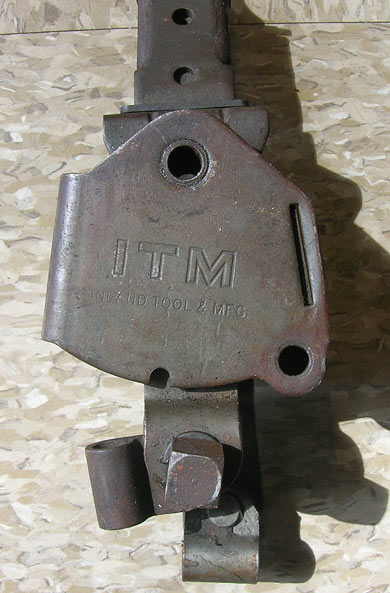 1968 Ford Torino - Close-up of a metal part stamped with 'ITM Inland Tool & Mfg.'.