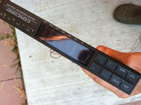 1968 Ford Torino - Concord graphic/parametric equalizer unit held in hand, showing frequency bands and memory buttons.