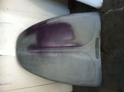 1968 Ford Torino - Volkswagen Beetle hood in primer, showing a patch of purple primer on the surface.