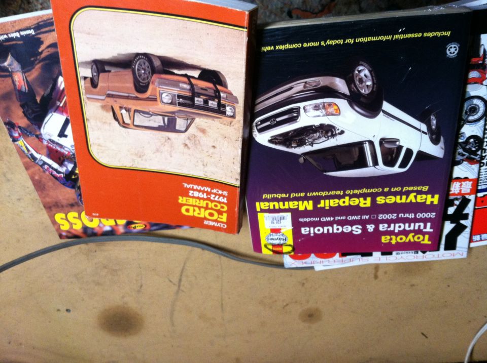 1972-1982 Ford Courier shop manual cover showing an overturned pickup truck