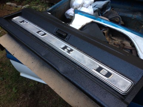 1971 Ford F-250 - Tailgate trim piece with Ford lettering, likely from a truck.