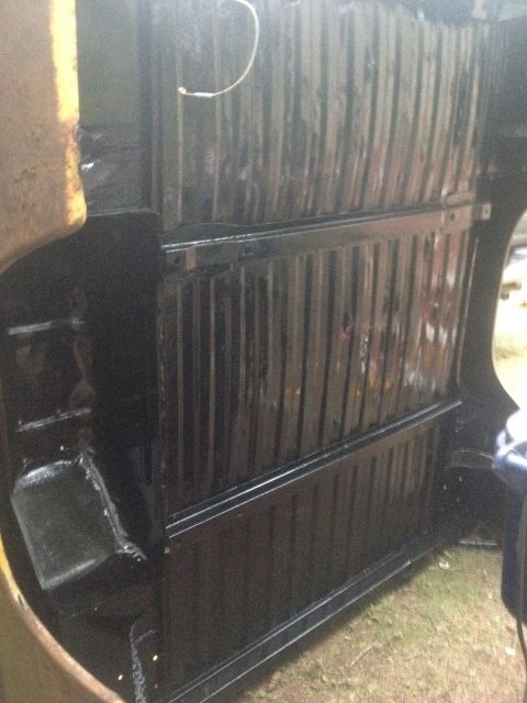 1971 Ford F-250 - The ribbed interior of a 1971 Ford F-250 truck bed has been painted black.