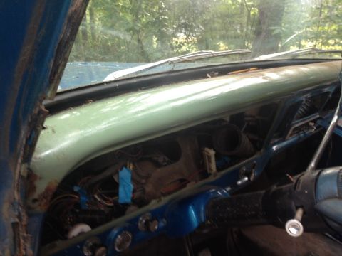 1971 Ford F-250 - Interior view of a 1971 Ford F-250 dashboard with visible wiring and parts.