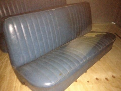 1971 Ford F-250 - A blue vinyl bench seat with a worn cushion is shown.