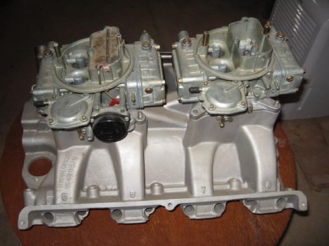 1963 Ford Galaxie - This photo shows a pair of carburetors attached to an intake manifold, likely for a performance engine build.