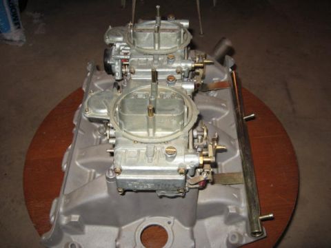 1963 Ford Galaxie - A pair of Holley carburetors are attached to an intake manifold, likely for a performance engine build.