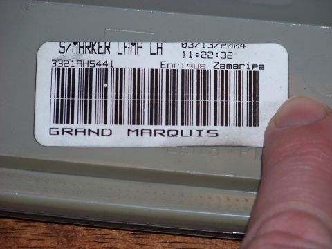 1995 Mercury Grand Marquis - A part labeled 'Grand Marquis' is shown with a barcode and date.