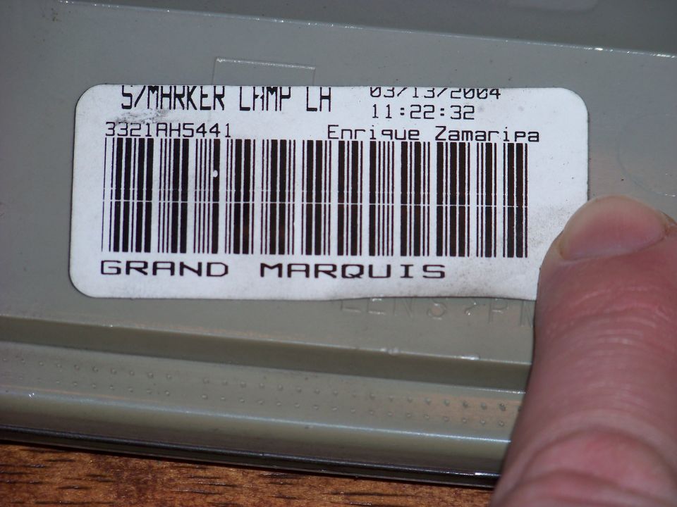 Marker lamp part labeled Grand Marquis