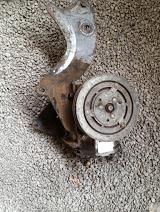 1968 Ford Torino - This is a photo of an air conditioning compressor assembly, likely a replacement part.