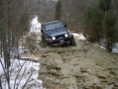 1995 Ford Bronco - My buddy in his TJ. He'd rather be climbing rocks, but we managed to get him dirty today.