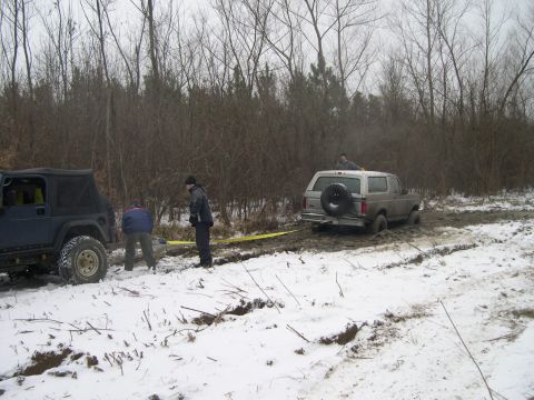 1995 Ford Bronco - Tried to back it out, but only got more bogged down. Had to hang my head and get yanked out by a jeep.
