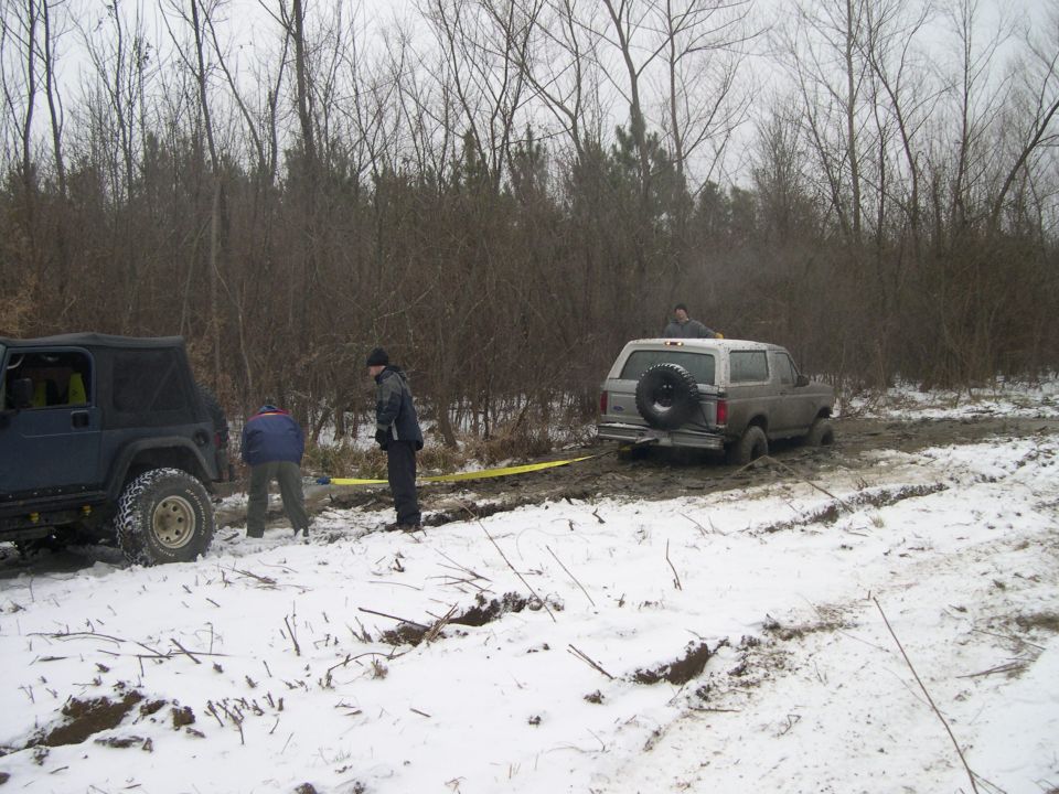 Tried to back it out, but only got more bogged down.  Had to hang my head and get yanked out by a jeep.