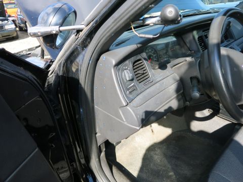 1991 Ford LTD Crown Victoria - Interior view of a 1991 Ford Crown Victoria LTD, focusing on the dashboard and door panel.