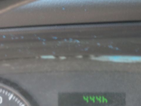 1991 Ford LTD Crown Victoria - Interior view of a vehicle's dashboard, showing a partial speedometer and a digital readout.