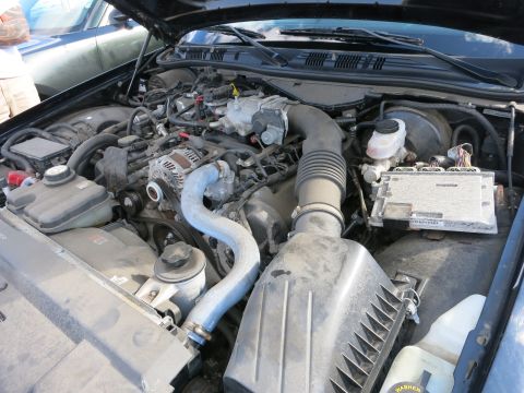 1991 Ford LTD Crown Victoria - Engine bay of a 1991 Ford Crown Victoria LTD, showing the V8 engine and associated components.