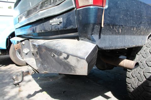 1994 Ford F-250 - Rear view of a Ford F-250 truck, showing a custom bumper and tow hitch.