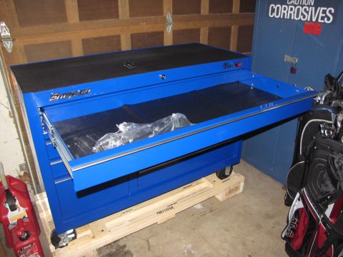 1992 Ford F-150 - A blue Snap-on tool chest sits on a wooden pallet, with a gas can and golf bag nearby.
