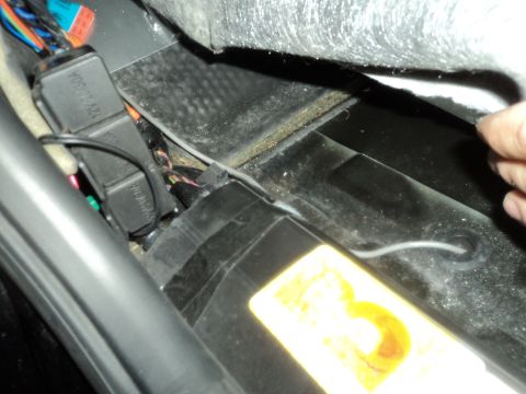 2004 Mercury Grand Marquis - Automotive electrical relay and wiring harness detail, with a yellow sticker visible.