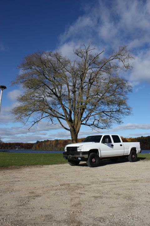 2006 Chevrolet Silverado 2500 - White 2006 Chevrolet Silverado 2500 parked outdoors near a body of water.