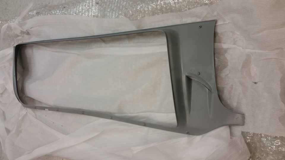 gray grille surround, possibly for a truck