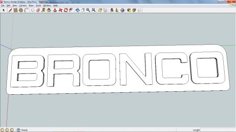 1995 Ford Bronco - A digital rendering of a Bronco emblem is displayed on a computer screen.