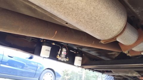 1994 GMC Suburban - Angle slightly farther back. That red wire at the back of the torsion bar crossmember is the current, factory location for the lift pump. I…