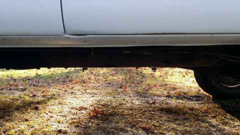 1994 GMC Suburban - So much for a nice flat belly. Looks like just the drain plugs will protrude below the bottom of the frame rail. Oh well, the 4wd on this o…