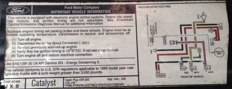 1993 Ford Bronco - This document is a vehicle information sticker detailing emissions compliance and vacuum hose routing, referencing the 1993 model year.