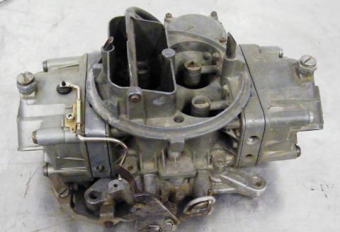 1968 Mercury Cougar - A detailed view of a Holley carburetor, a key component in many internal combustion engines.