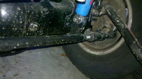 1982 Ford Bronco - This image shows a detailed view of the undercarriage of a vehicle, focusing on the suspension system.