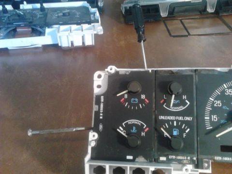 1990 Ford F-250 - start by removing the other gauges. gently and cautiously pry evenly to remove each section. they are only held in by the connections to th…