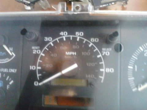 1990 Ford F-250 - you will have to drill 2 new holes in the lens for the buttons on the new speedo. I test fitted the lense and marked it with a marker. I en…