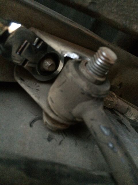 1997 Dodge 3500 - Detail of a sway bar end link connection, showing the hardware involved.