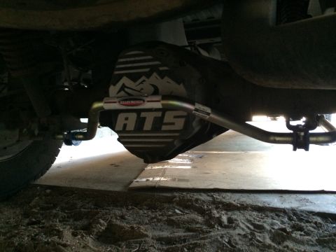 1997 Dodge 3500 - Close-up of a vehicle's rear differential and sway bar, ATS branding on the cover.