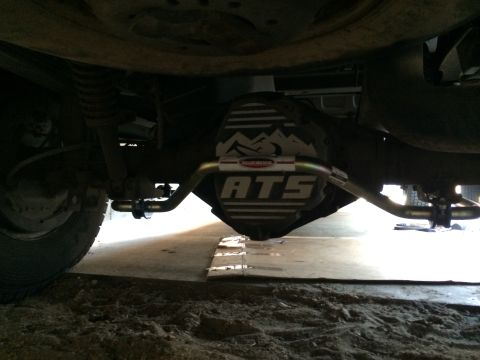 1997 Dodge 3500 - Underside view of a vehicle's rear differential and sway bar assembly.